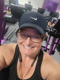 Do people wear hats to the gym for fashion or sweating purposes?