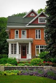 Grey roofs look best over orange and yellow bricks. Buyer Beware Pick The Right Roof Shingle Colors Chrissy Marie Blog