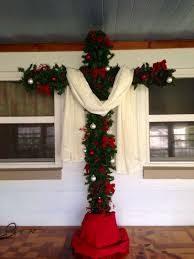 Our Cross Christmas Tree Made With Rough Hewn Cedar Boards And Garland We Kept The Decorati Church Christmas Decorations Christmas Church Cross Christmas Tree