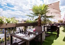 Rooftop Paris Les Meilleurs Rooftops De Paris Ou Boire Un Verre Elle Rooftop Paris Paris Terrasse Rooftop