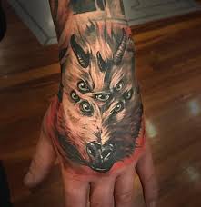 7 Eyed Goat Hand Tattoo Hand Tattoos Hand Tattoos For Guys Butterfly Hand Tattoo