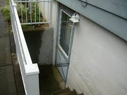 Reboot your outdoor space with these fresh garden ideas. Preventing Clogging Flooding At Bottom Of Exterior Basement Steps Home Improvement Stack Exchange