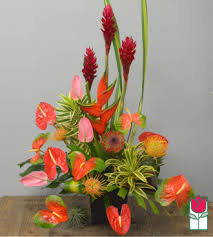 Roses have that radiance to bring a beautiful smile on the recipient's face; Honolulu Funeral Florist Beretania S Stunning Tropical Bouquet B Tropical Varieties Vary B Honolulu Hi 96814 Ftd Florist Flower And Gift Delivery