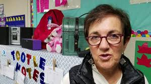 Harrah fourth grade students part of artist's worldwide photo project