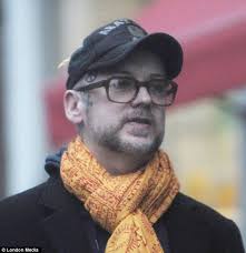 Boy George resembles Jarvis Cocker as he sports a shabby beard and glasses 