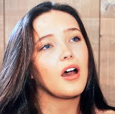 Amira promoting one of her CDs.