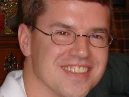 Police issue arrest warrant in insurance agent's killing