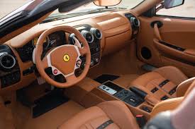 The plastic rear window is a type of eisen glass that will crease and become opaque with age. Ferrari F430 Interior Wild Country Fine Arts