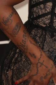 This dollar sign tattoo design is made on the background of the deck of cards which is a great and innovative way to show what kind of suggestion you want to make. 20 Celebrity Dollar Sign Tattoos Steal Her Style
