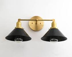 Well actually i shouldn't call myself a slacker because i was pretty busy between hanging my new vanity light and doing things with my kids. Wall Sconce Vanity Light Modern Mid Century Gold Bathroom Sconce Black Shade Vanity Lighting Bathroom Sconces Sconces Bathroom Wall Lights