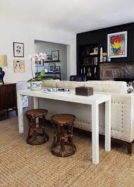 Redefining The Sofa Table Add Chairs Sofa Table Decor Sofa Table Styling Couch Decor