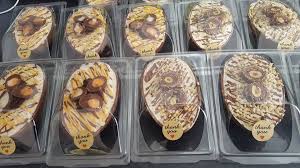 Dip each egg in the chocolate with a spoon. Creme Egg And Ferrero Rocher Cheesecakes Exist