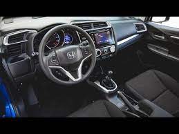 The fit is a simple, clean affair around back, with a single chrome accent under the rear window and with the low price of the fit, interior finishes and comfort play second fiddle to cost reductions. Honda 2015 Honda Fit Ex Manual Interior Youtube