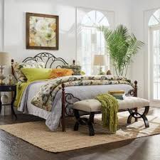 A round table with 4 chairs, all supported by wrought iron supports, enhance your dining space with a sturdy classical elegance. Queen Iron Beds Bedroom Furniture The Home Depot