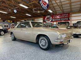 Image result for Sierra Tan 1965 Corvair