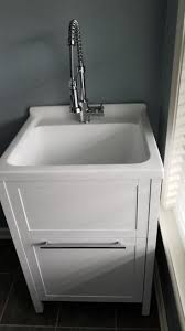 The uniquely designed laundry/utility sink cabinet integrates seamlessly into many spaces, with its classic finishing look and durable components, offering ease of convenience, specifically for a laundry room, workshop, basement, or garage. Schon Eleni All In One Kit 24 In X 22 In X 37 8 In Acrylic Utility Sink With Cabinet In White Laundry Room Diy Laundry Room Utility Sink Utility Room Sinks