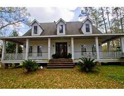 Acadian style house plans with wrap around porch. Love The Porches Acadian Homes Acadian Style Homes Acadian Style House