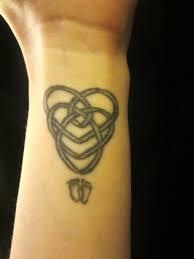For the most part these dress codes are legal as long as they are not discriminatory. Two Of My Tattoos Celtic Symbol For Motherhood The Pro Life Symbol I Am About 99 Sure I Will Baby Foot Tattoo Unique Tattoo Designs Baby Feet Tattoos
