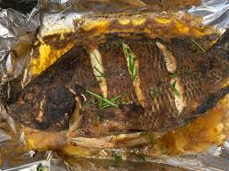 How To Cook A Tilapia Fish Simple Yummies Recipe Whole Tilapia Recipes Tilapia Fish Recipes Talapia Recipes