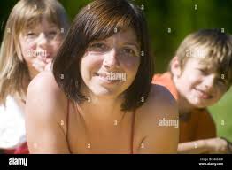 Two sisters and brother hi-res stock photography and images