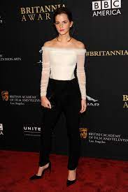 A black satin balloon dress from balenciaga Dress Du Jour Emma Watson S Chic Balenciaga Ensemble The Hollywood Reporter