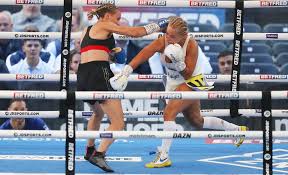 Ebanie Bridges shares nasty pic of suspected broken hand after hard-fought  win over Mailys Gangloff