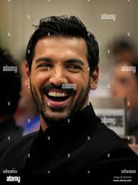 Bollywood actor John Abraham attends the National Film Awards 2012, in New  Delhi, India , Friday, May 3, 2013. Abraham's debut production "Vicky  Donor" received three awards. (AP Photo /Manish Swarup Stock Photo