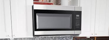 Most microwaves are configured so the power cord extends up through the floor of the upper cabinet above the microwave, so the best place for this wall outlet is inside the upper cabinet. Microwaves Amana