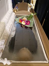 What's more absurd: Napoleon being buried in a coffin with four layers of  tin, mahogany, lead and mahogany again, then inside a gigantic dome OR face  down, open casket or me