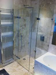 The classic white tiles add a touch of simplicity and elegance. Made To Measure Bespoke Frameless Shower Ideas Room H2o