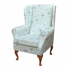 The fabric is slightly paler than pictured but that is to its advantage. Standard Wingback Chair In Bergen Seafoam Blue Floral Fabric Beaumont
