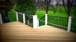 I came inside and looked at the corresponding place in my ceiling where wall and ceiling meet and for the tip of a point, and i saw a few bees near a. White Deck Railing Treated Deck With Black Westbury Railing And White Posts Building A Deck Decks Backyard Deck