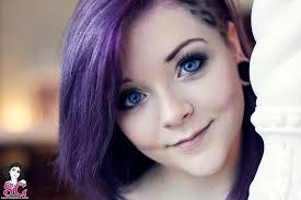 Woman in black outfit with purple hair. Hd Wallpaper Pair Of Black Ear Gauge Earrings Purple Hair Blue Eyes Suicide Girls Wallpaper Flare