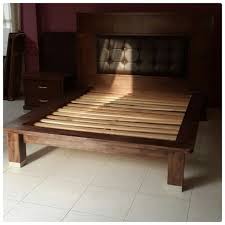 for sale wood bed with leather good condation price 35 bd للبيع سرير خشب خلفية جلد بحالة ممتازة السعر 35 bd tel 33770050 home decor furniture home