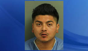 Raleigh man accused of headbutting EMS worker in the throat at crash scene