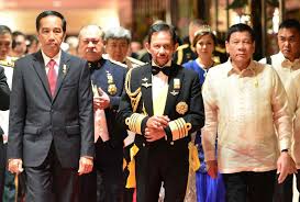 Geography about the size of delaware, brunei is an independent sultanate on the northwest coast of the island of borneo in the south china sea, wedged between the malaysian states of sabah and sarawak. How Long Can Brunei Keep Punching Above Its Weight Nikkei Asia