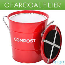 If the contents of your bin aren't breaking down, add some greens, turn it, and it should start turning into compost again. Spigo Steel Kitchen Compost Bin With Vented Charcoal Filter And Bucket Red 1 Gallon Overstock 28266066