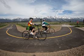 Talk with them until they say that they want to move to your town. Biking In The Park Grand Teton National Park U S National Park Service