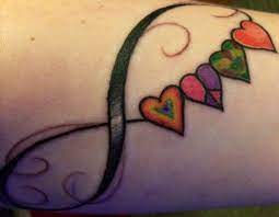 Finally Got My Infinity Symbol With Hearts And It S Way Better Than I Ever Imagined It To Be Each Hooligan Picked Their Tattoos Infinity Tattoos Mom Tattoos