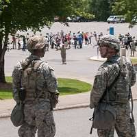 Army Pfc. Phillip Hill, left, and Spc. Brandon Sinor,