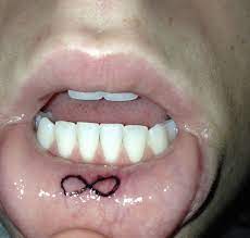 Pin By Kat Veronica On Weird Shit And Unicorns Inner Lip Tattoo Lip Tattoos Tattoos