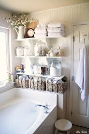 This contemporary vanity design is a nice juxtaposition to the heavily patterned wallcovering in this small but mighty bathroom. Diy Bathroom Linen Shelves Shabby Chic Bathroom Bathroom Decor Home Decor