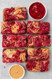 I love to bake all kinds of goodies with my two daughters, and my husband loves to sample the treats. Peanut Butter And Jelly Oatmeal Bars Goodness Avenue