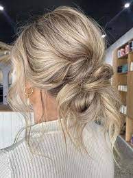 Amazing Undone Textured Hair Styles To Show Off In 2021 In 2021 Textured Hair Bun Styles Bun Hairstyles