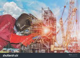 Industrial Welding Closeup Or Worker Welding Arc Closeup With Spark Light At Construction Site Project Wearing Equ Industrial Welding Spark Light Stock Photos