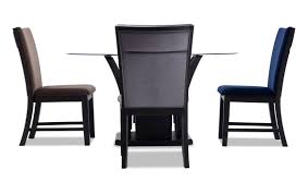 Browse our variety of shapes, features, and finishes from simple stained wood models to 5 piece dining room sets with four cushioned side chairs and a storage area in the table base. Cosmopolitan Round Multicolored 5 Piece Dining Set Bob S Discount Furniture