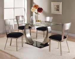 The gleaming white glass top is rectangular and seats four in style. Extraordinary Glass Dining Tables For Finest Service Pinoy House Designs Pinoy House Designs