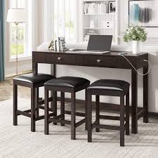 They are differentiated from more traditional dining room sets mainly because both the table and the chairs are taller. Amazon Com Lz Leisure Zone Dining Table Set 4 Piece Counter Height Table Set With Socket And Leather Padded Stools Multipurpose Rustic Bar Dining Table Set With 2 Drawers Table Chair Sets