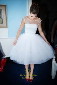 Simidress has a large collection of lace mermaid wedding dresses at affordable prices, we support free custom made and. Simple White Scoop Neck Illusion Neck Wedding Dress Tea Length Vampal Dresses