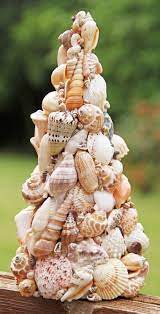 There are endless ways they can be incorporated into a seashell coastal. Beautiful Seashell Cone Christmas Trees Diy Shop Coastal Decor Ideas Interior Design Diy Shopping